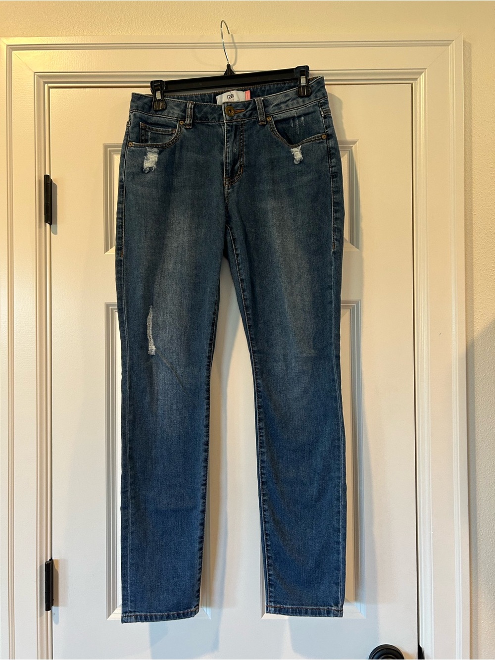 CAbi Women's Curvy Skinny Jeans in Dark Blue with Distressed Details